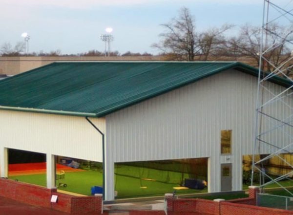 Outdoor sports facility with batting cage and green roof